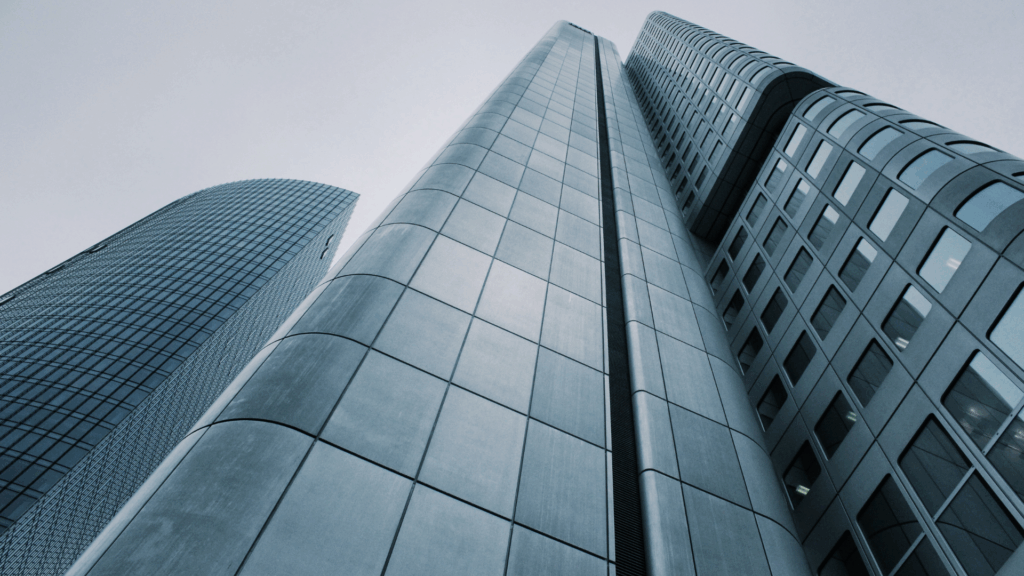 upward view of city buildings as one of many real estate marketing ideas