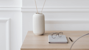 vase and tablet on desk