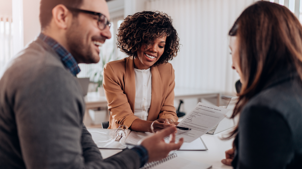 group of professionals working on a company-generated leads plan
